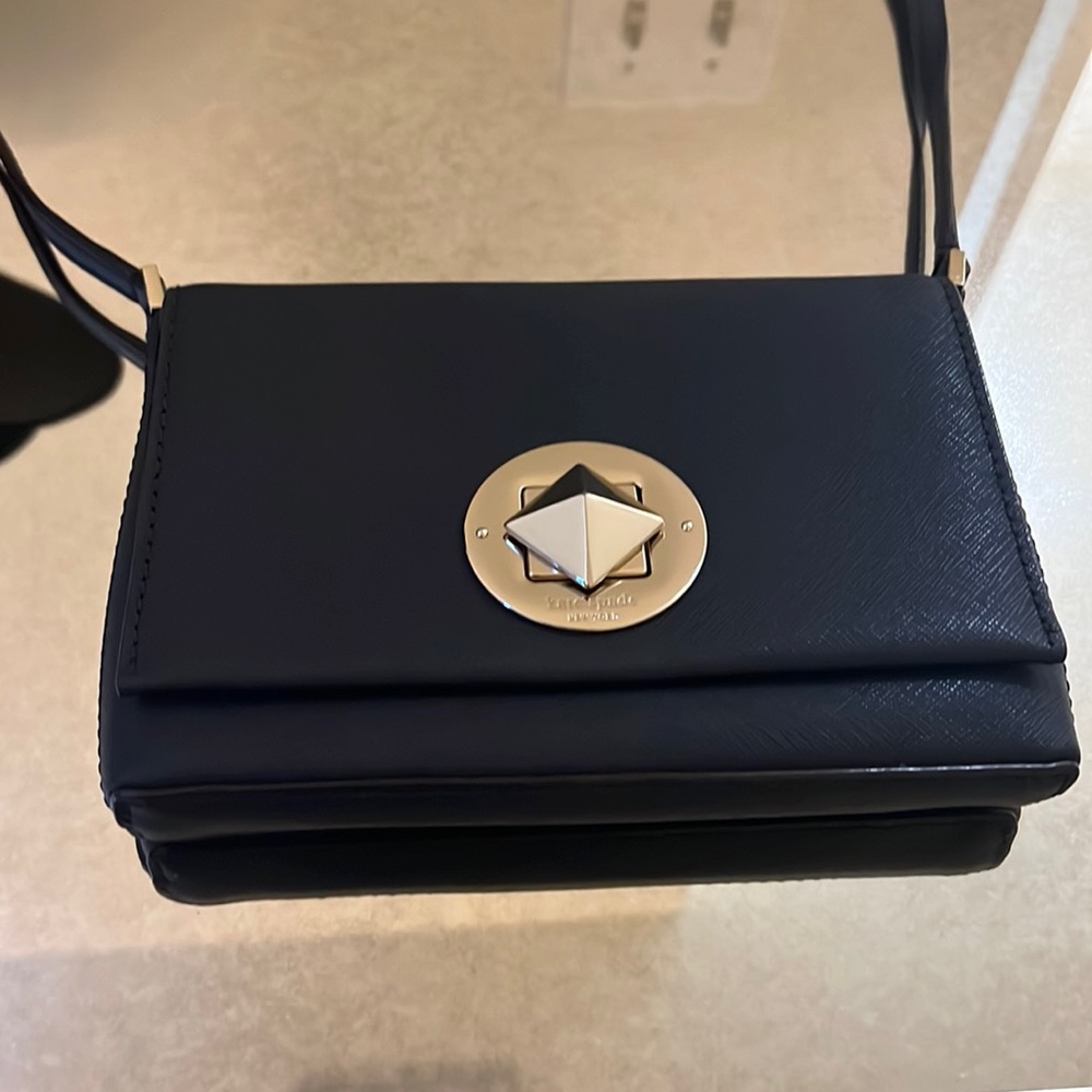 Navy blue Kate spade cross body bag with gold hardware